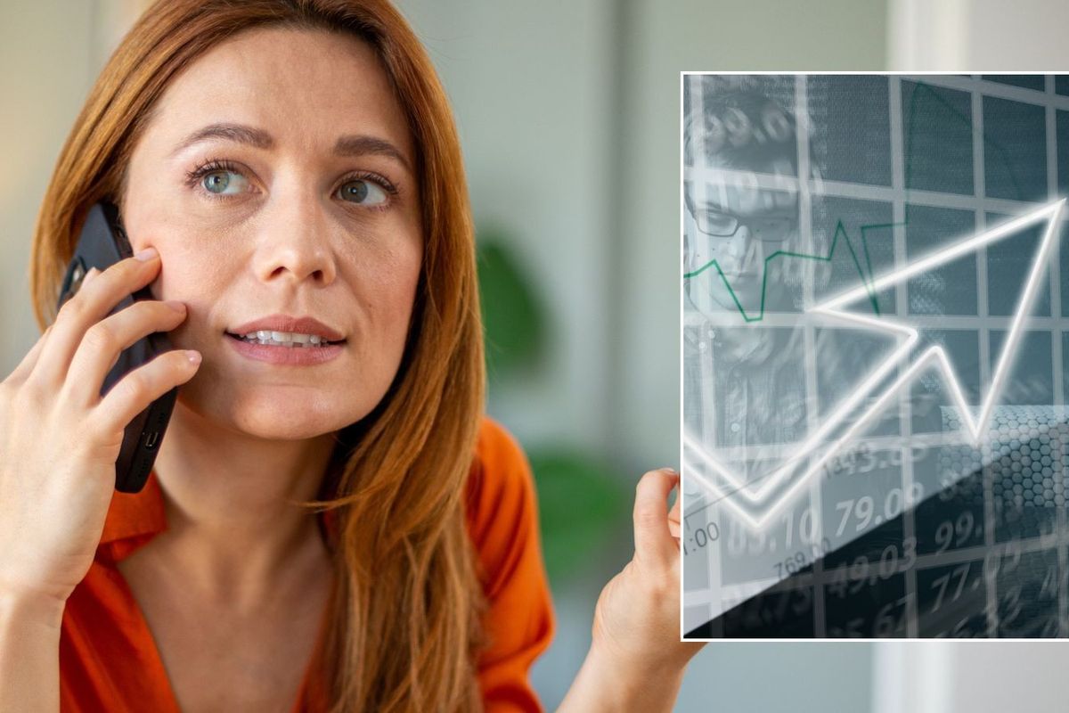 Woman on phone and interest rate rise