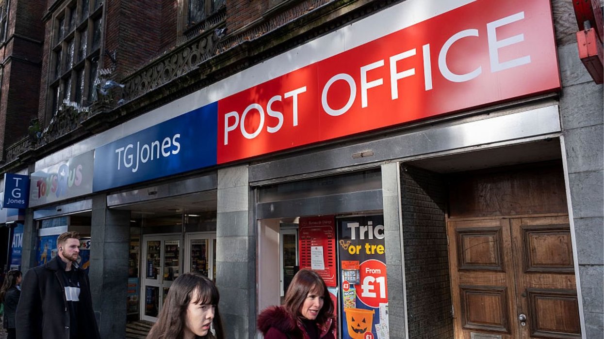 Woman on phone and Post Office