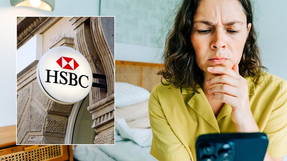 Woman on phpne and HSBC branch