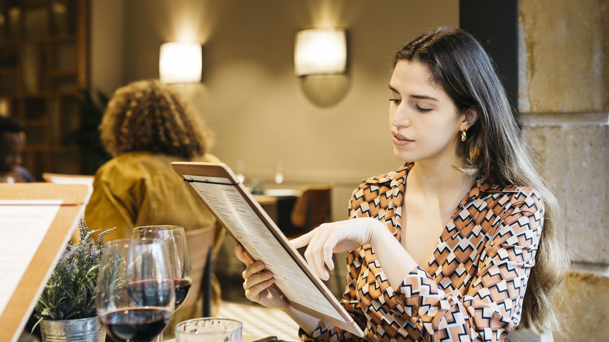 Woman ordering at a table