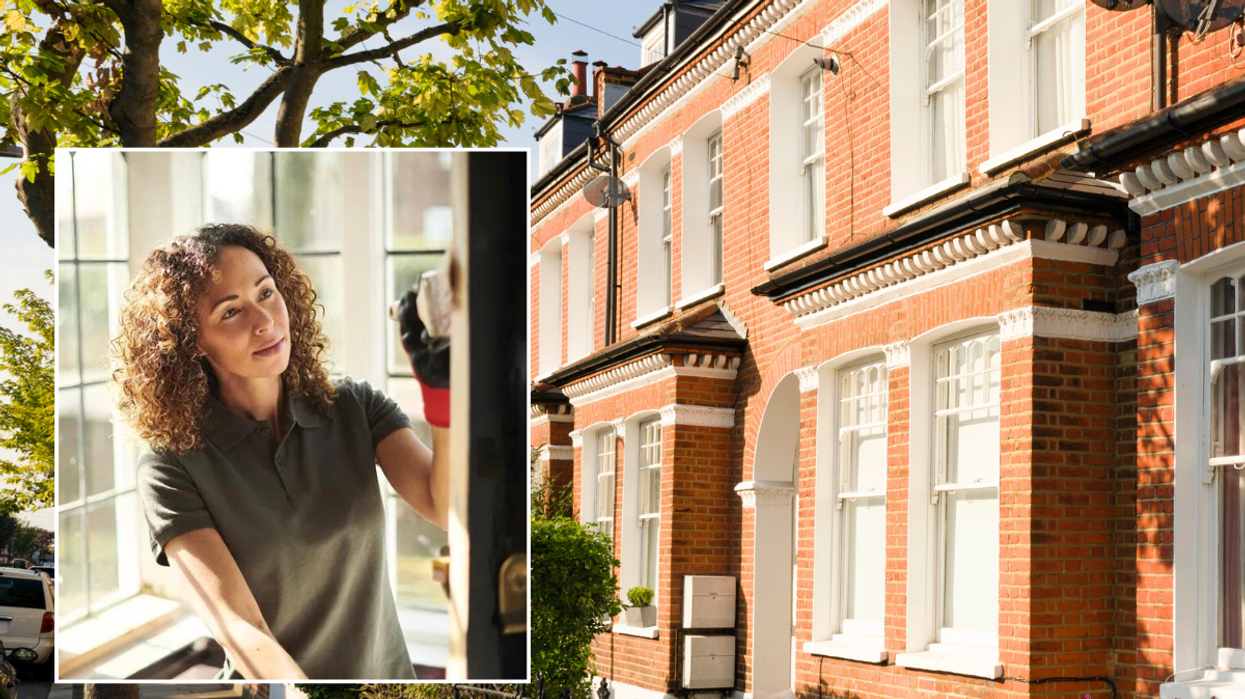 Woman painting / houses