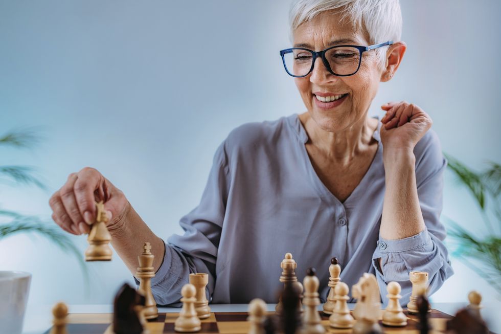 Woman playing chess