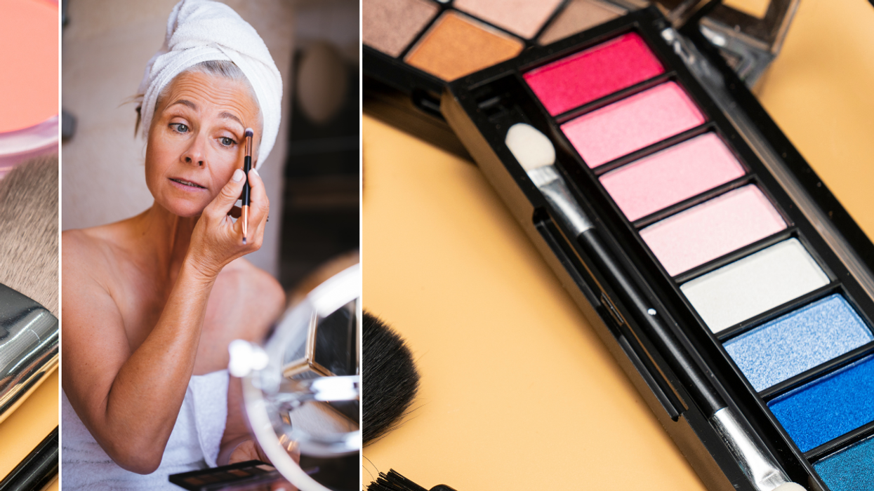 Woman putting on eyeshadow / make-up