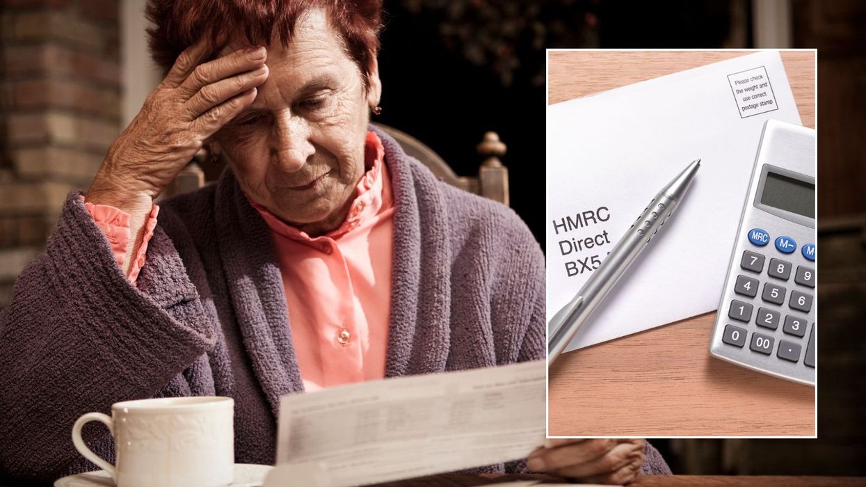 Woman reading letter and HMRC letter
