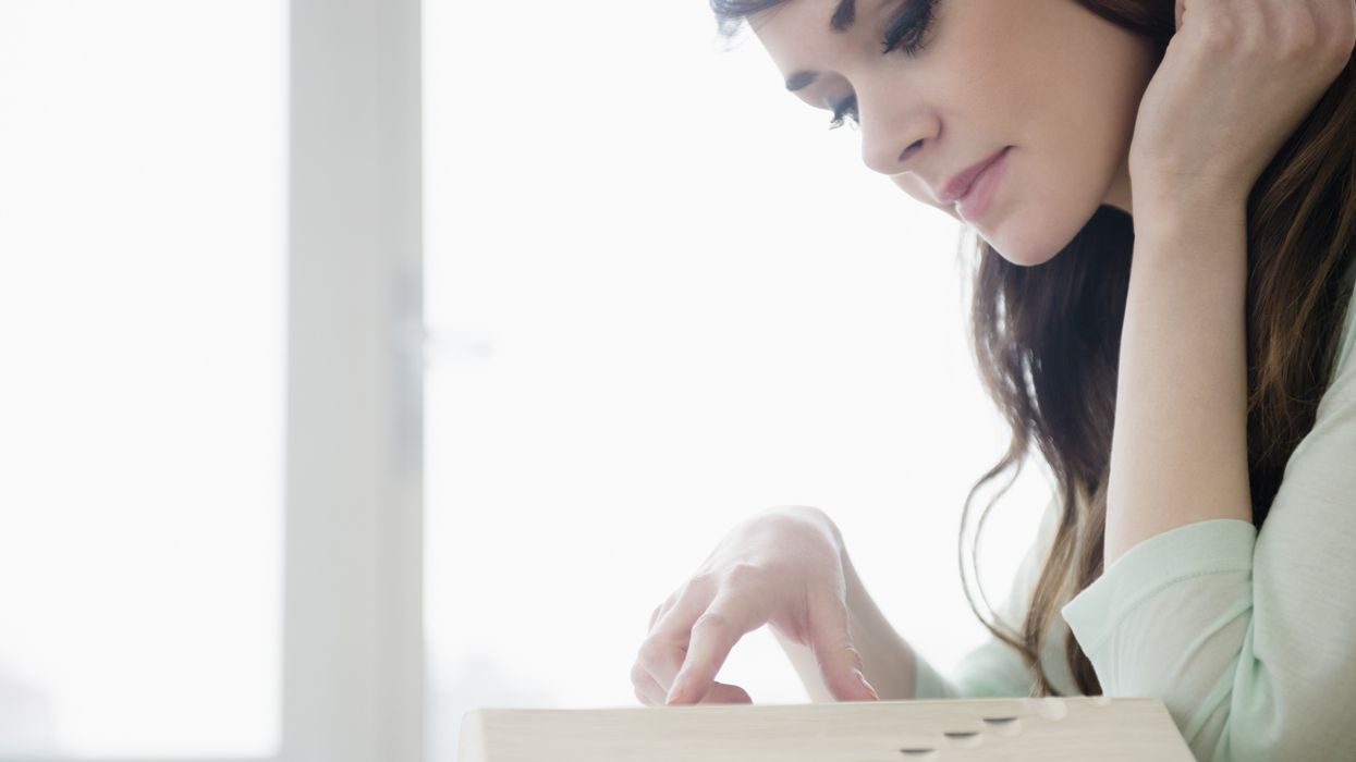 Woman reading the dictionary