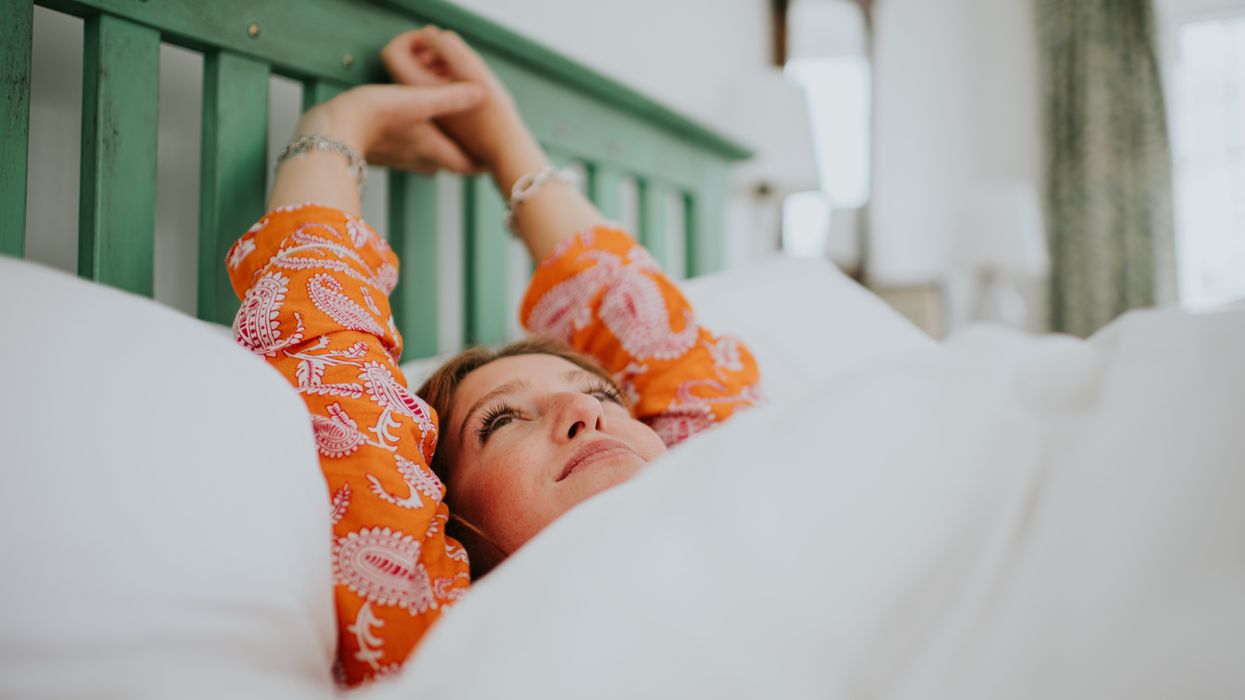 Woman resting on mattress topper