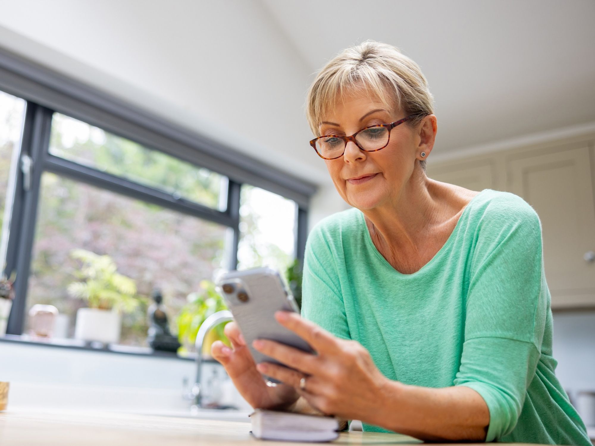 Woman scrolling on her phone