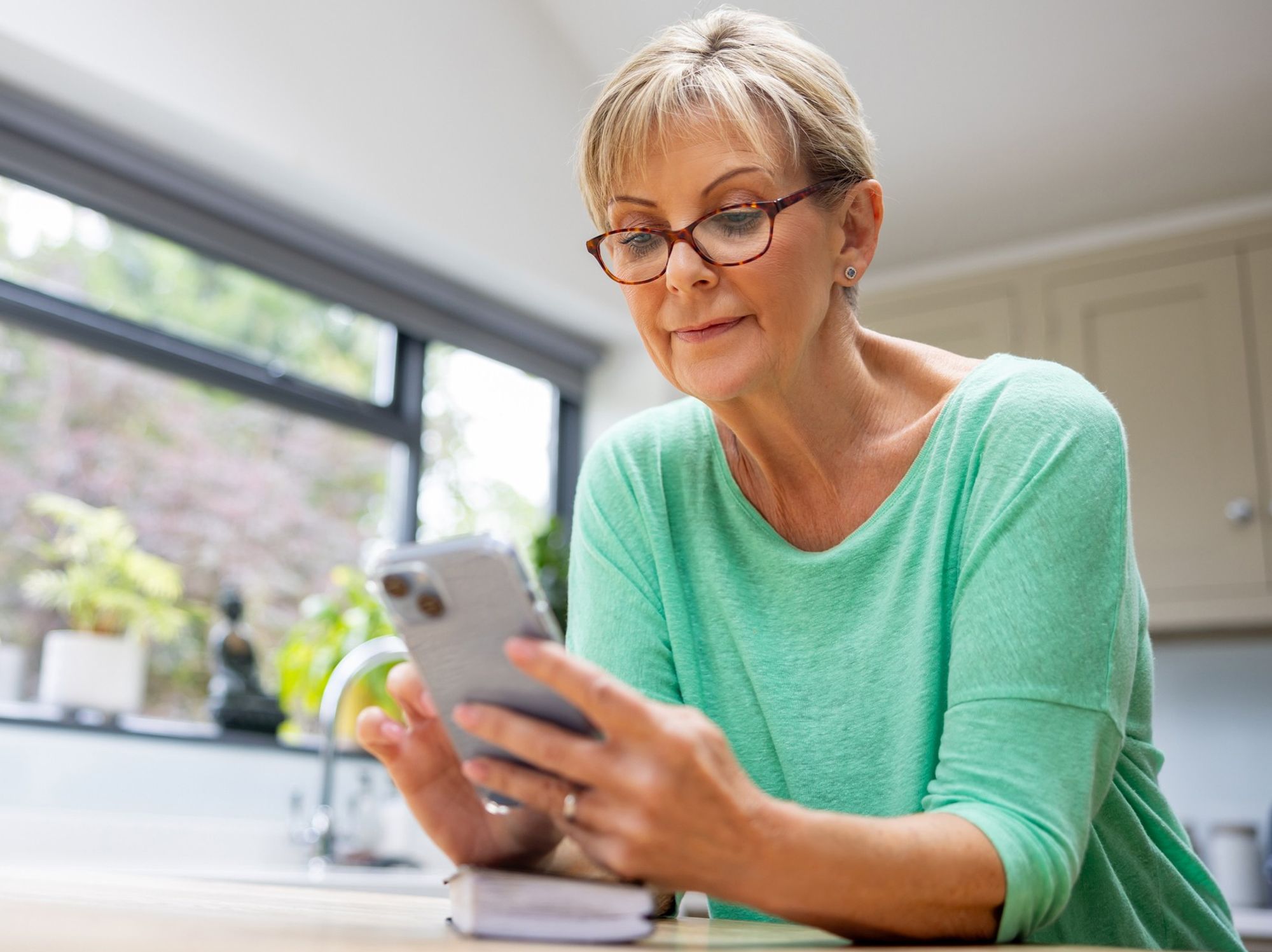 Woman scrolling on her phone