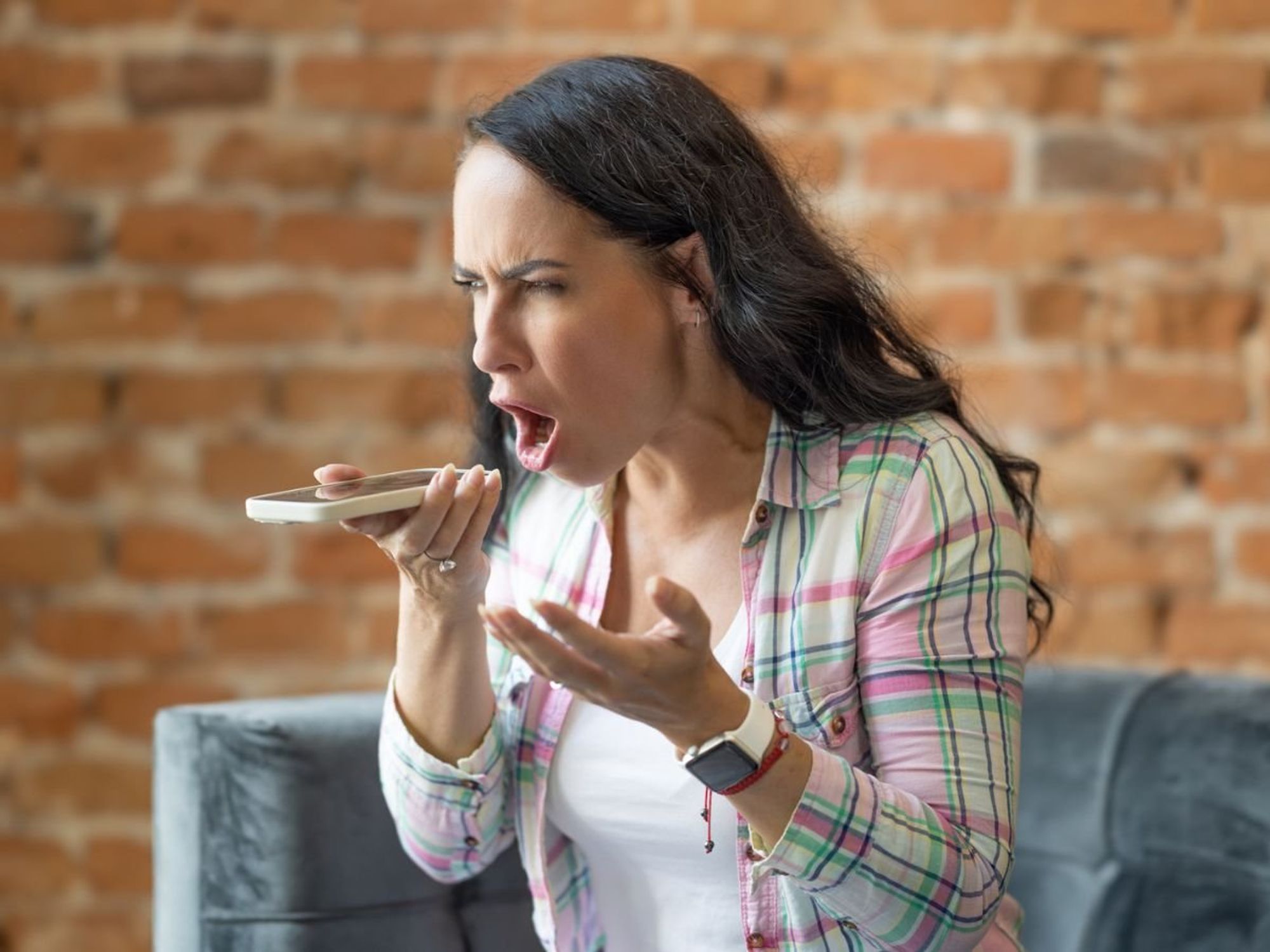 Woman shouting on phone