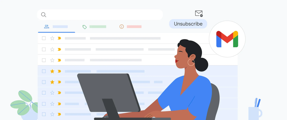 Woman sitting at desk with Gmail open