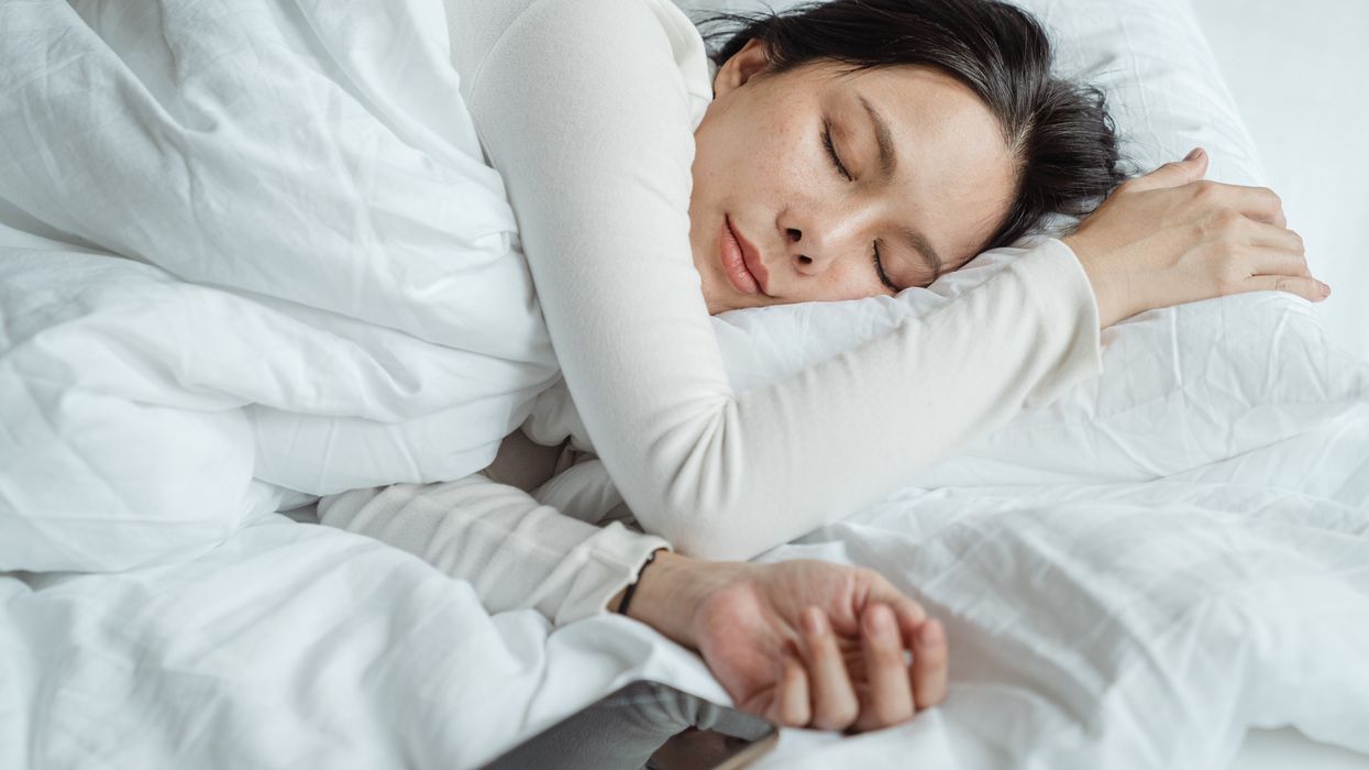 Woman sleeping on bed