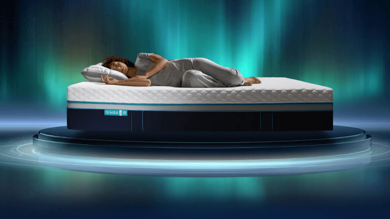 Woman sleeping on her side on a Simba mattress