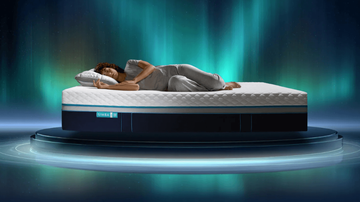 Woman sleeping on her side on a Simba mattress