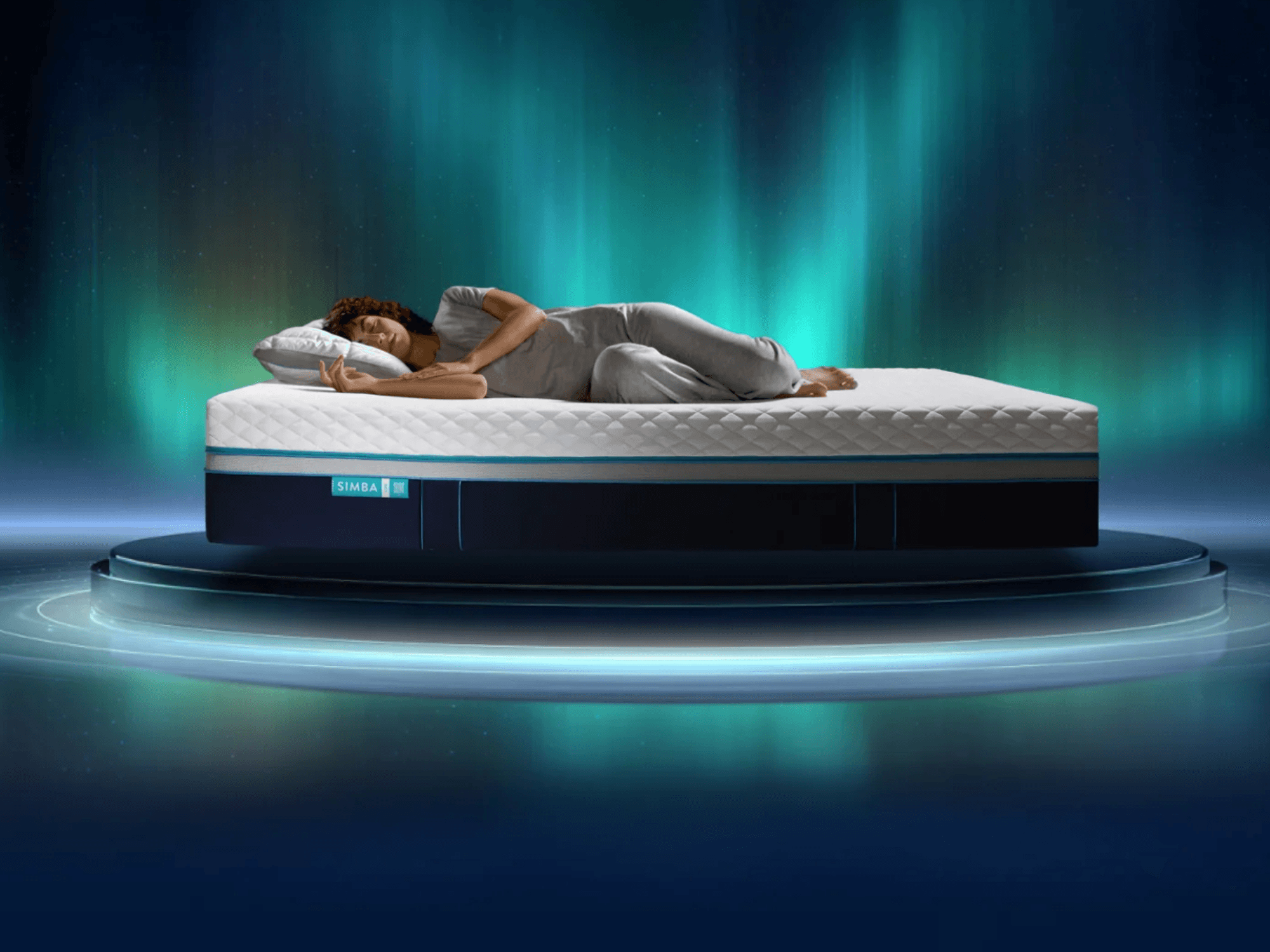 Woman sleeping on her side on a Simba mattress
