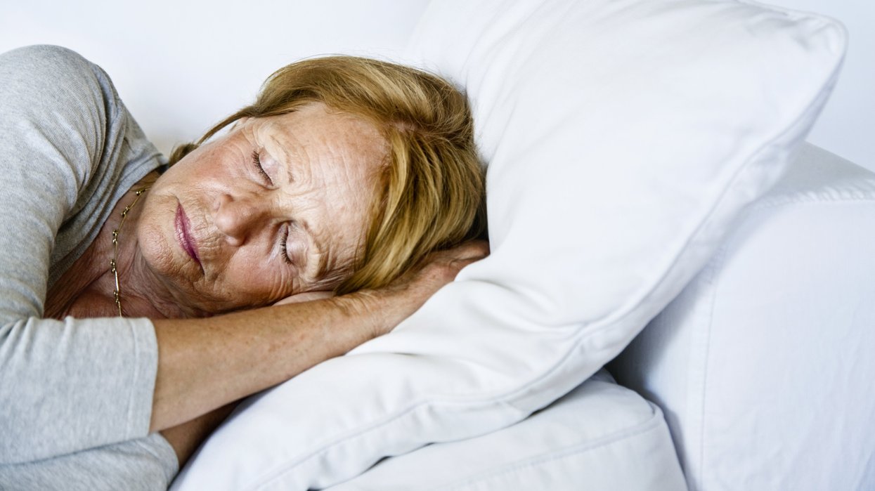 WOMAN SLEEPING ON SIDE