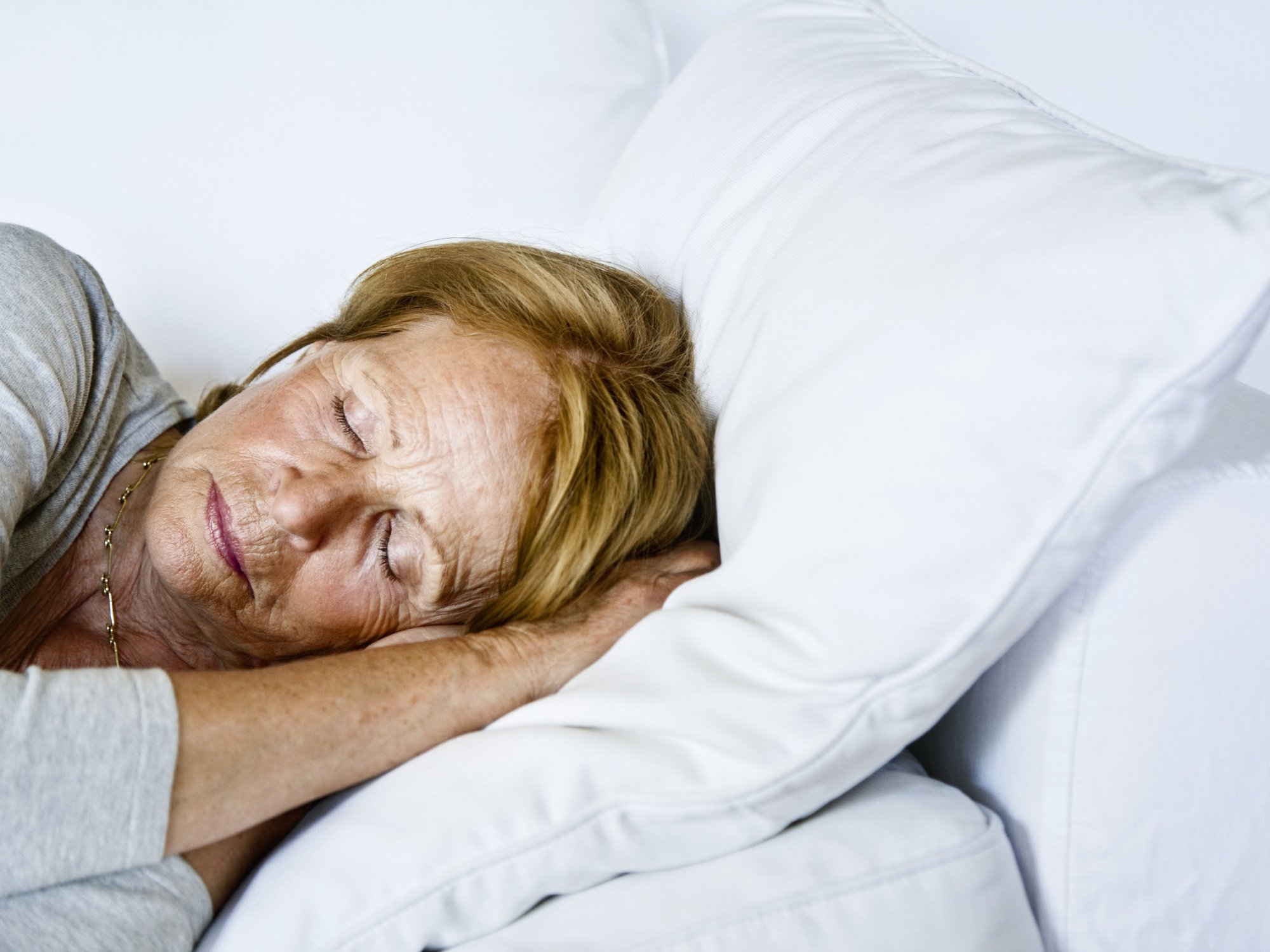 WOMAN SLEEPING ON SIDE