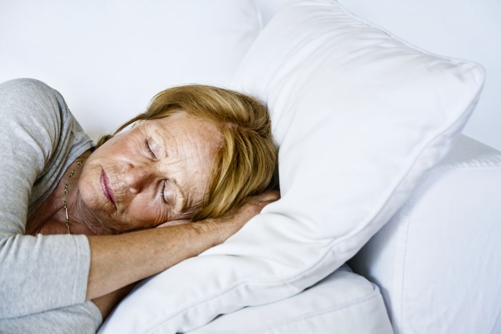 WOMAN SLEEPING ON SIDE