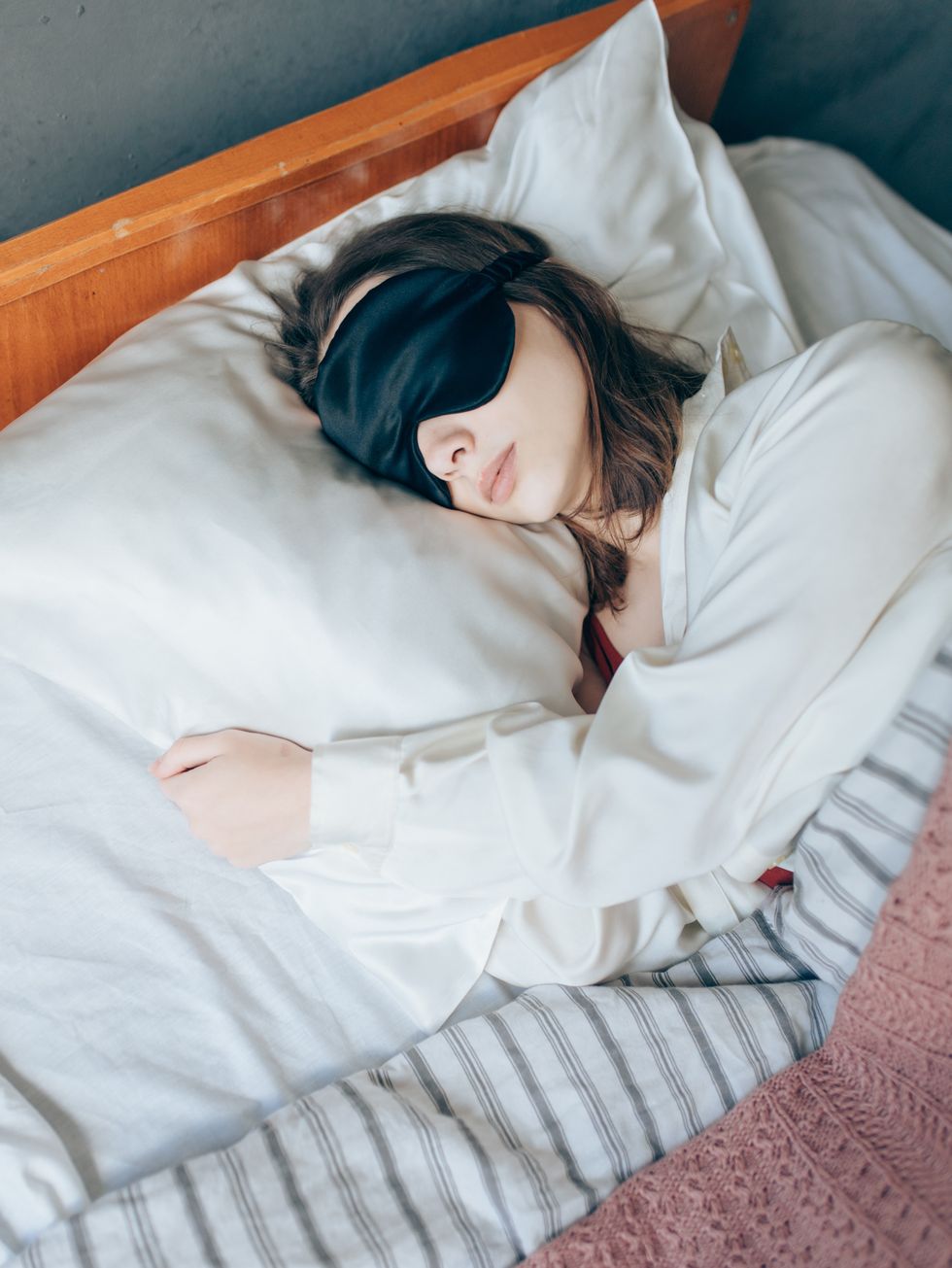 Woman sleeping with silk pillowcase