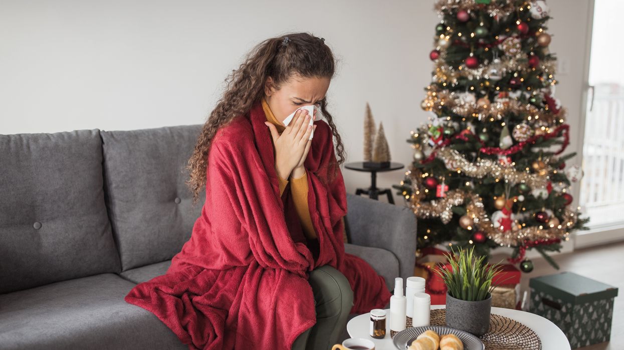 Woman sneezing Christmas