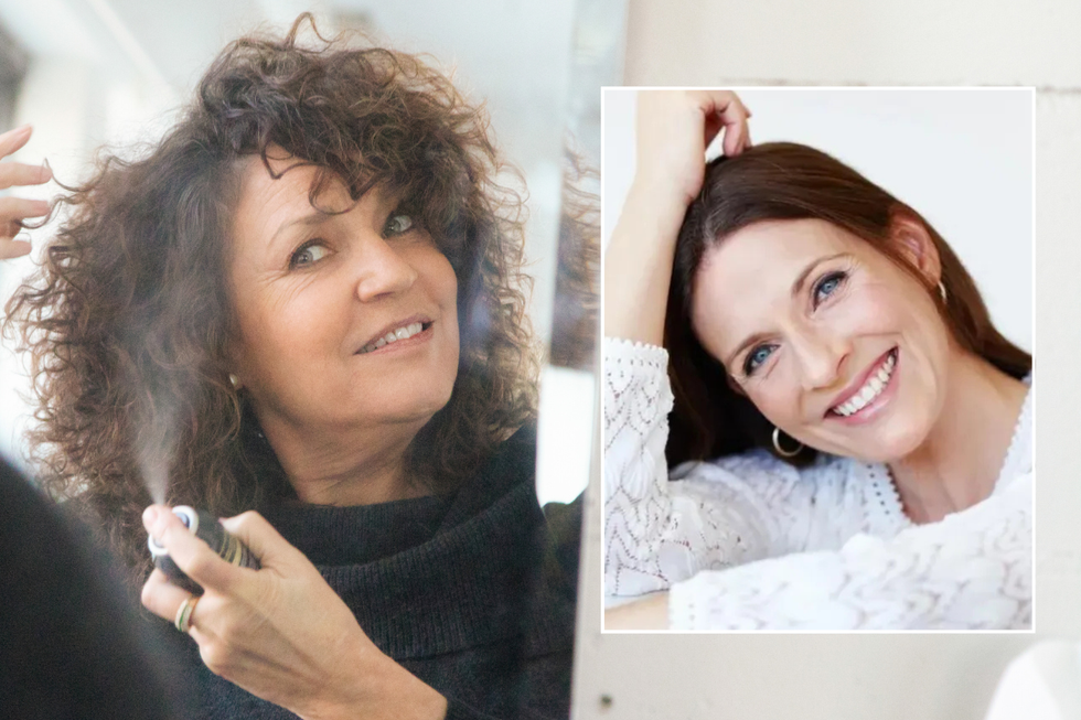 Woman spraying hair / middle aged woman