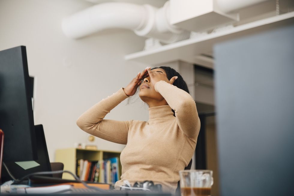 Woman stressed at desk