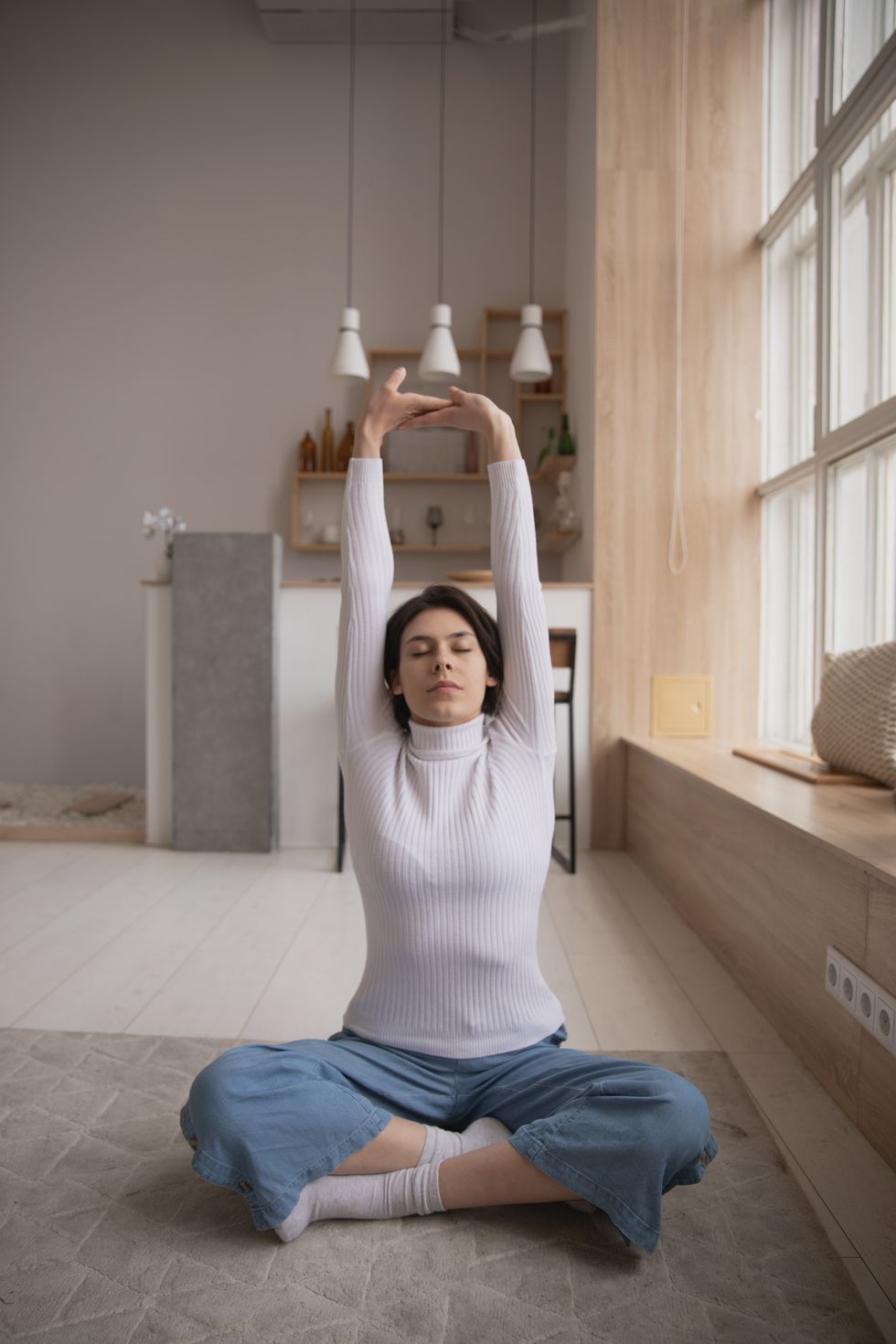 Woman stretching and doing yoga