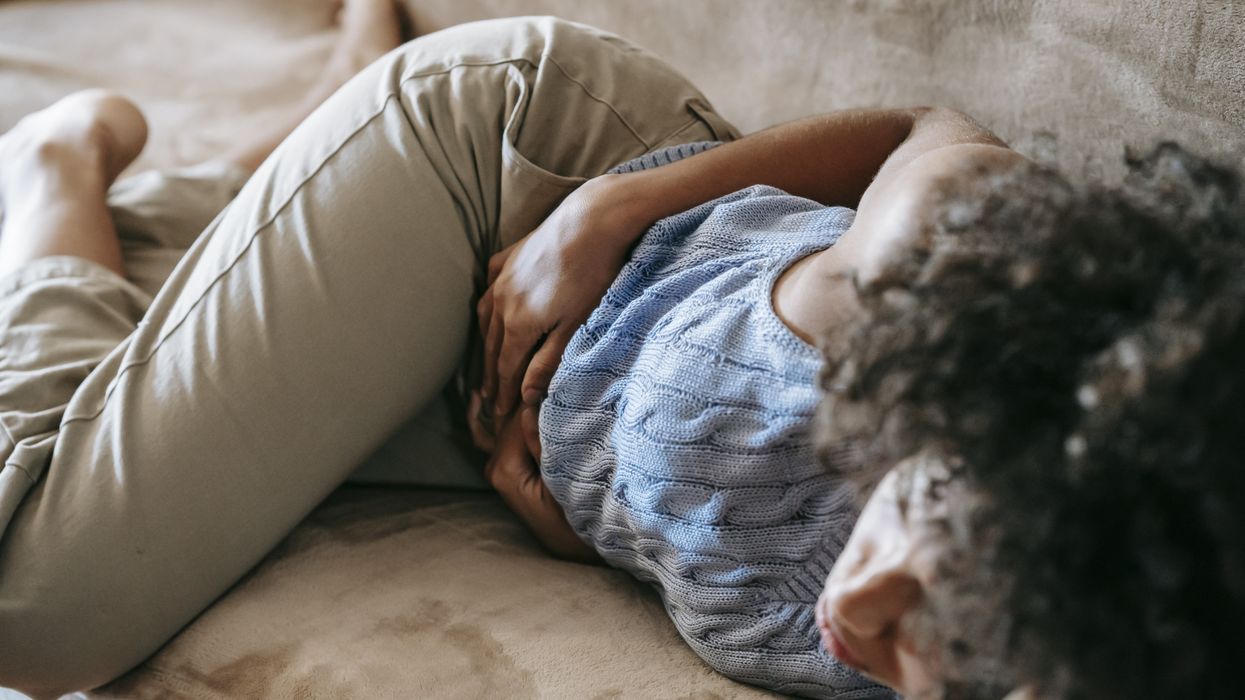 Woman suffering with a tummy ache