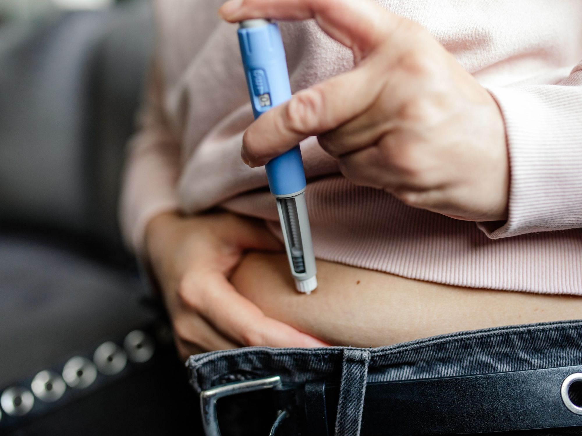 Woman taking a fat jab