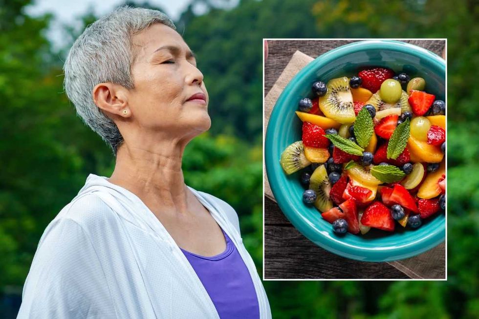 WOMAN TAKING DEEP BREATHS