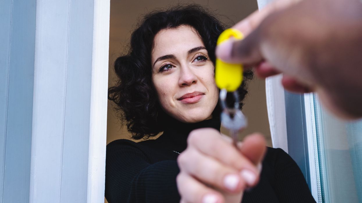 woman taking keys