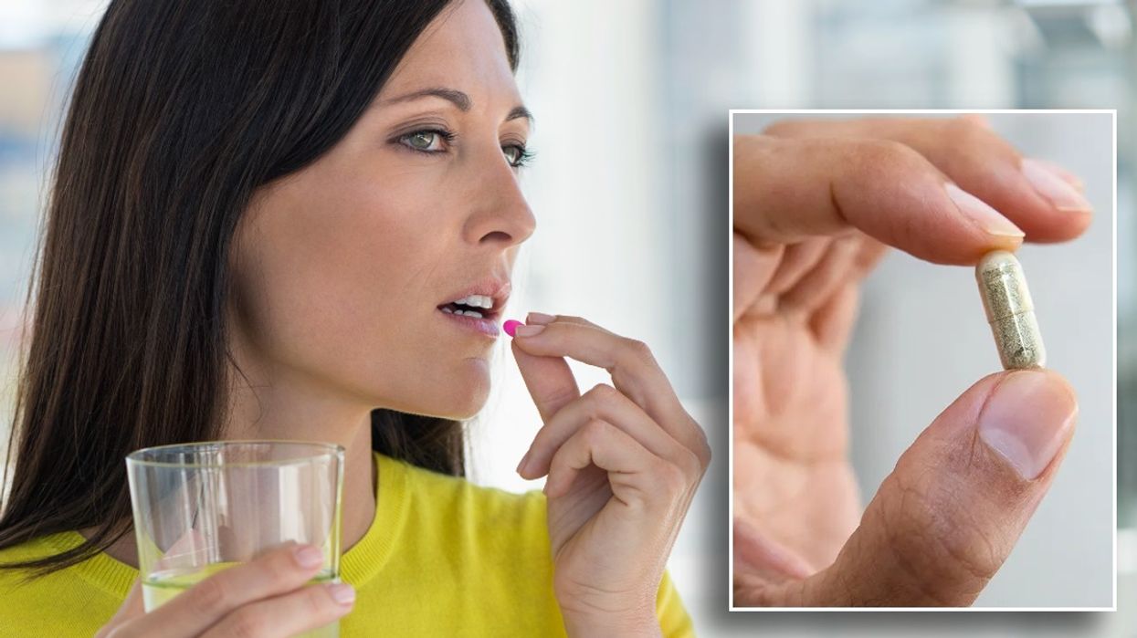 Woman taking pill and man holding supplement
