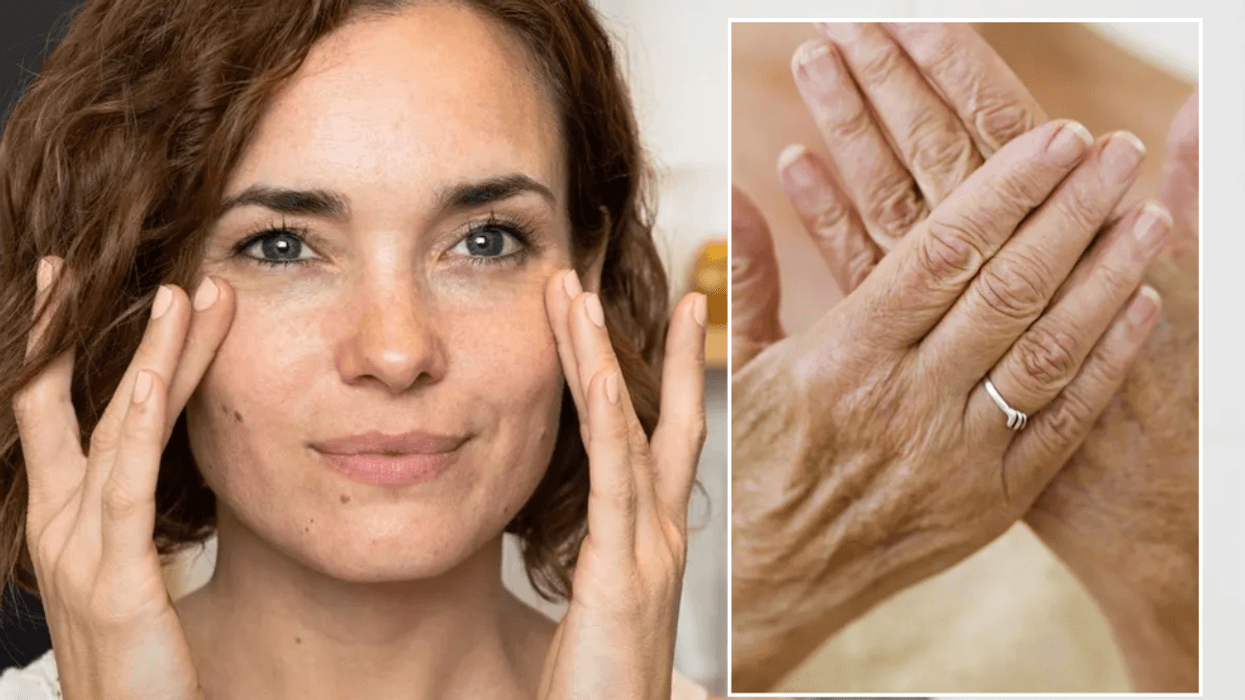 Woman touching face doing her skin care / middle aged hands