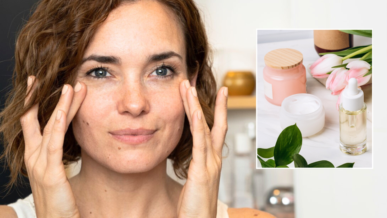 Woman touching face / skin care products