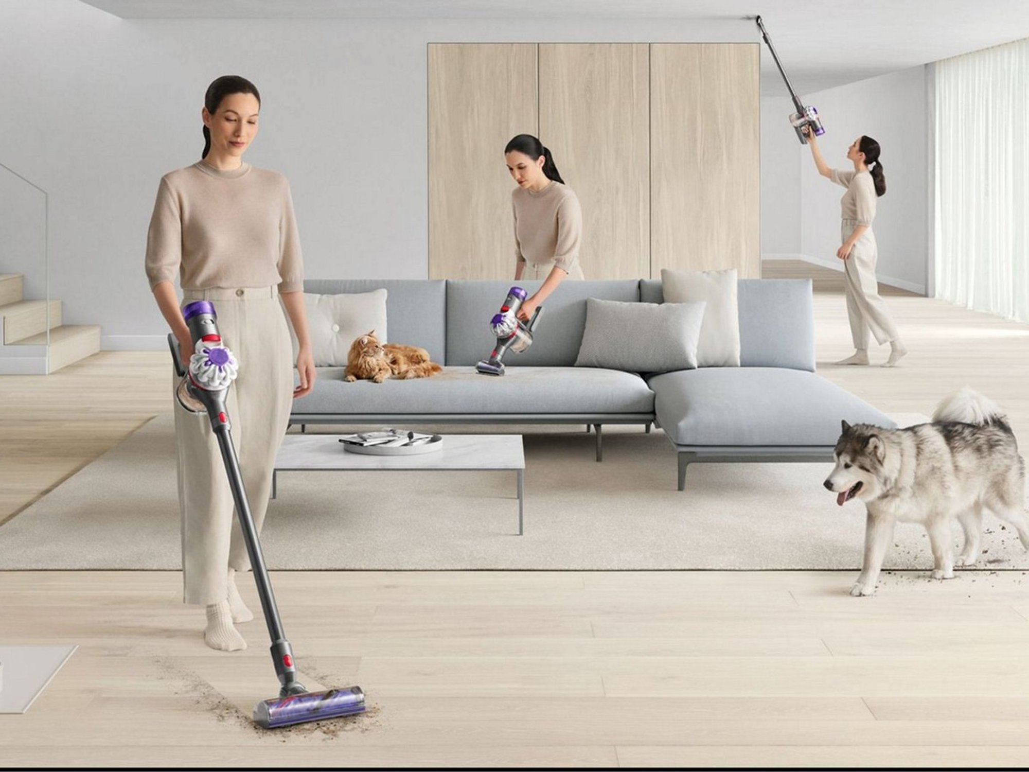 Woman using different attachments on the Dyson V8 Absolute
