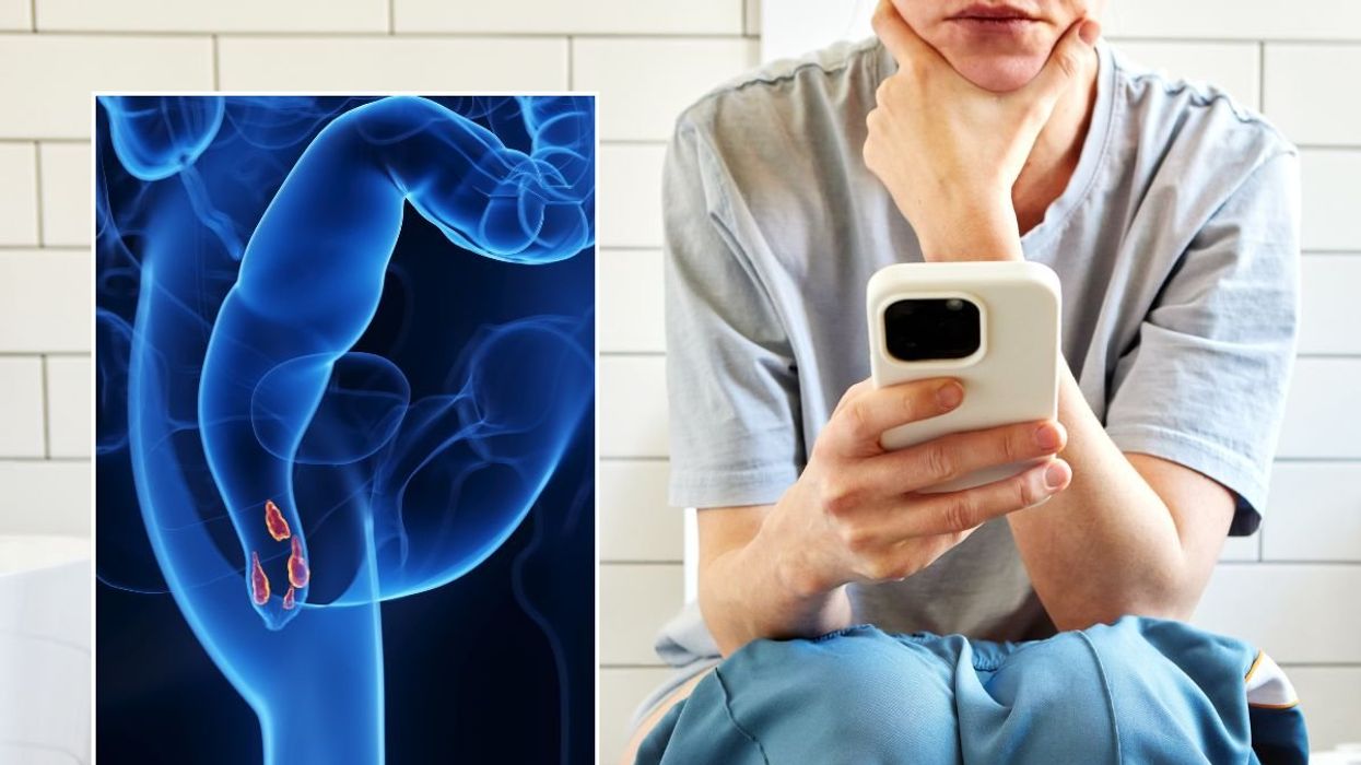 WOMAN USING PHONE ON TOILET