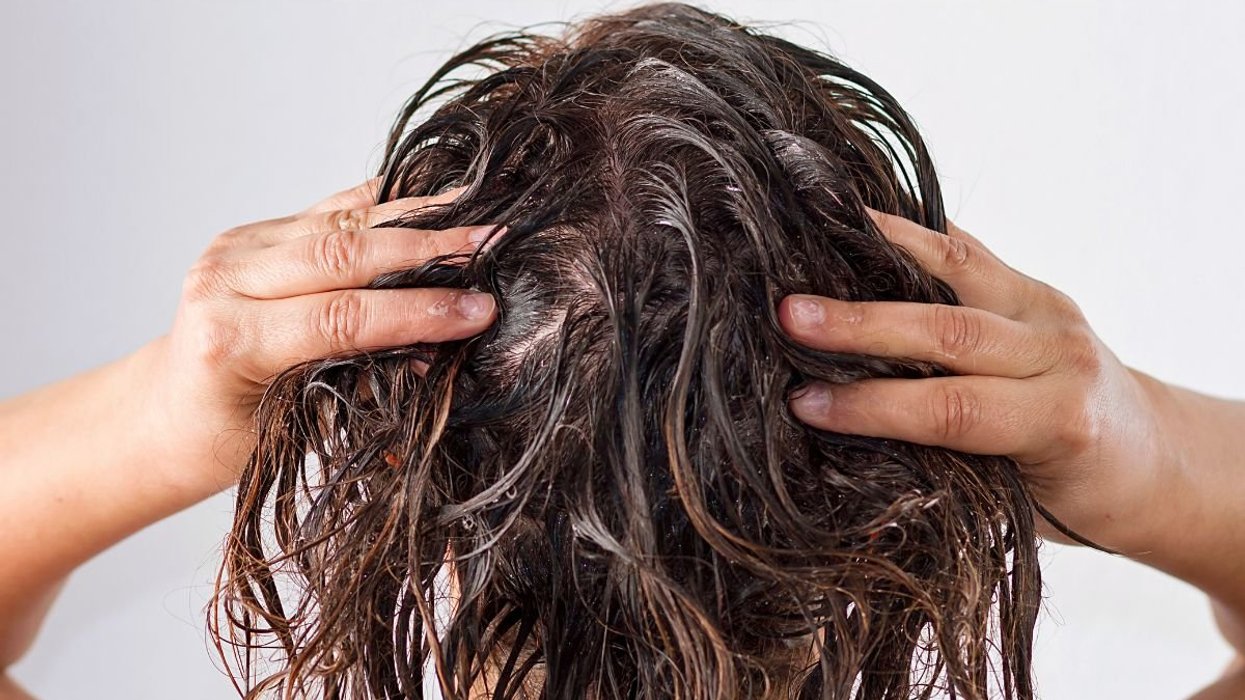 WOMAN WASHING HAIR