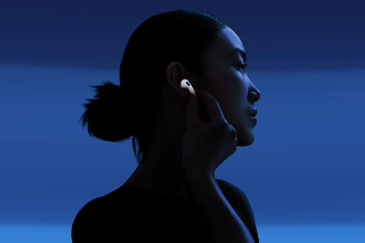Woman wearing Airpods 4