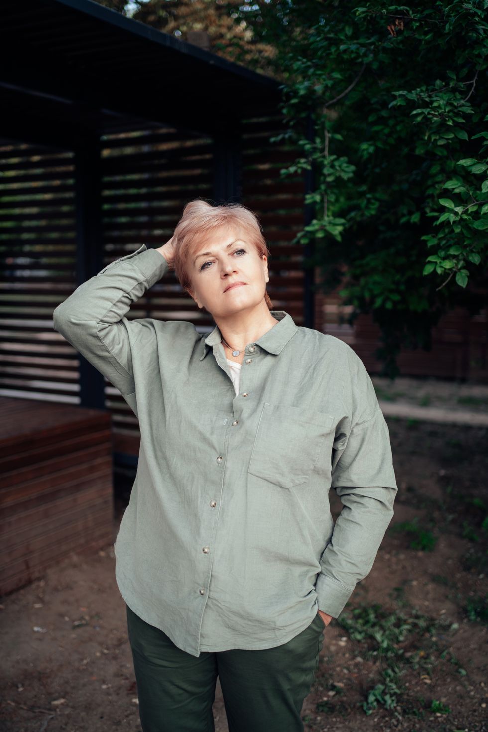 Woman wearing baggy shirt