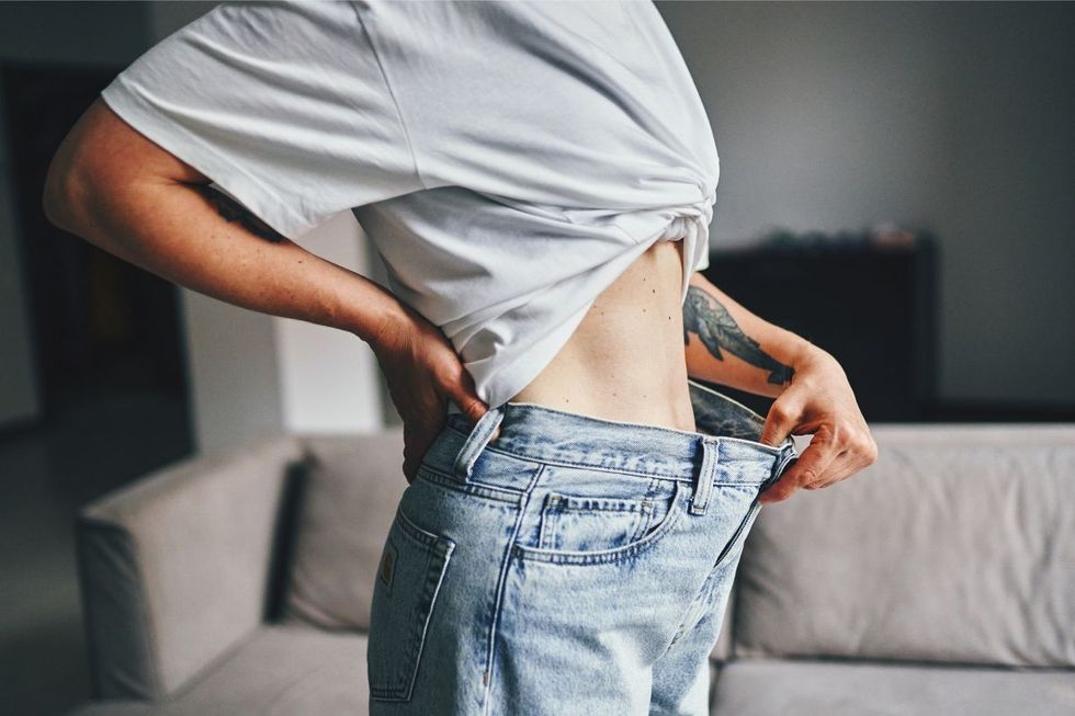 Woman wearing oversized jeans