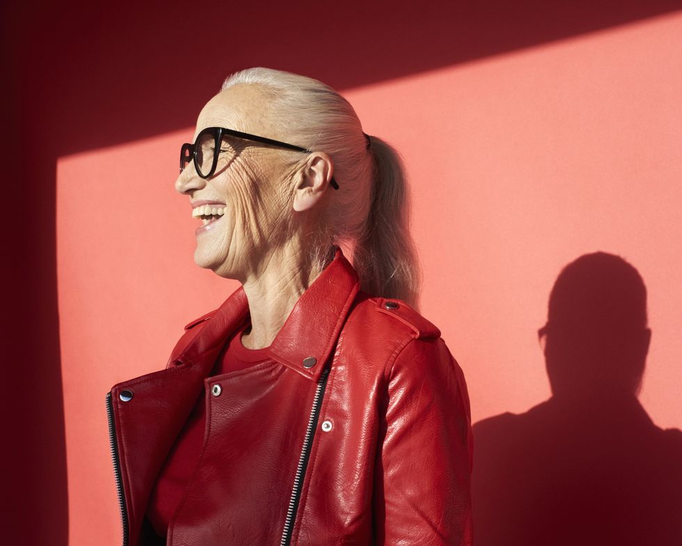 Woman wearing red leather jacket