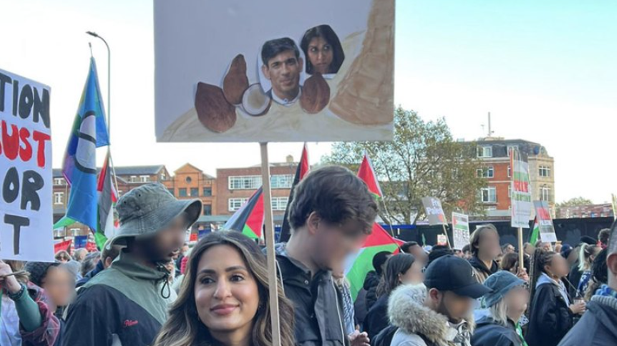 Woman wielding poster