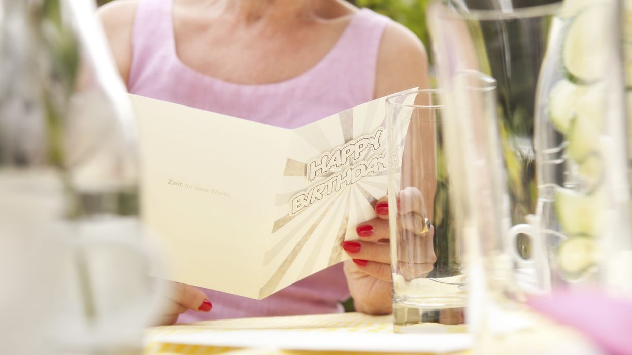 Woman with a birthday card