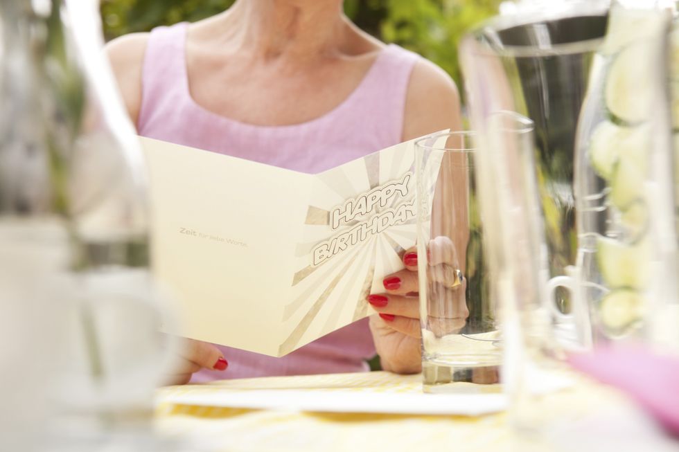 Woman with a birthday card
