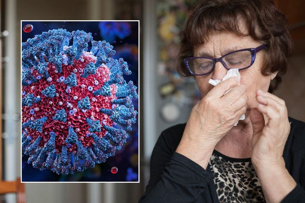 WOMAN WITH COLD SYMPTOMS