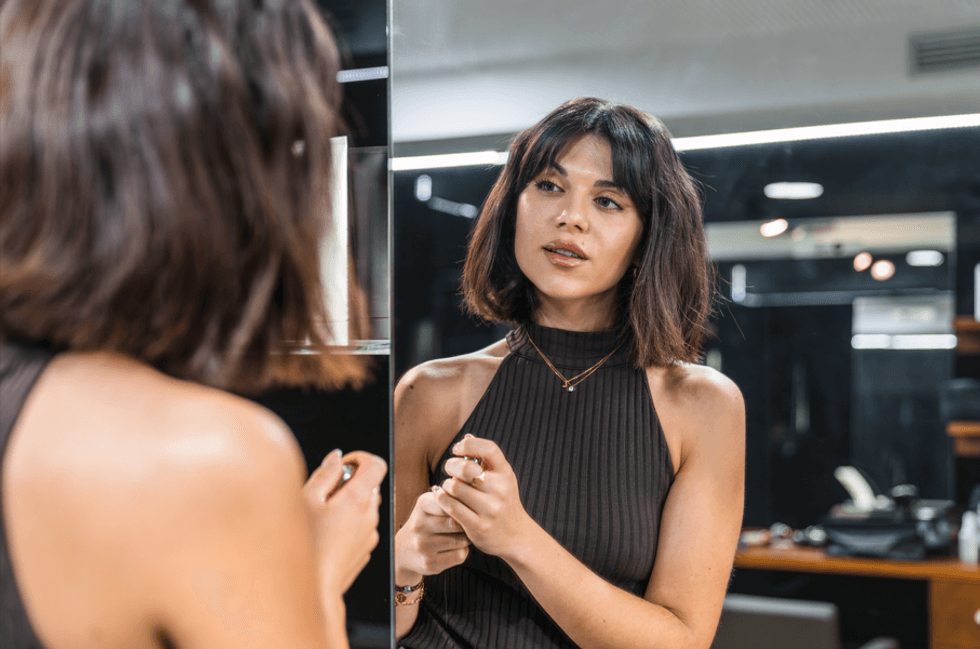 Woman with curtain bangs and bob