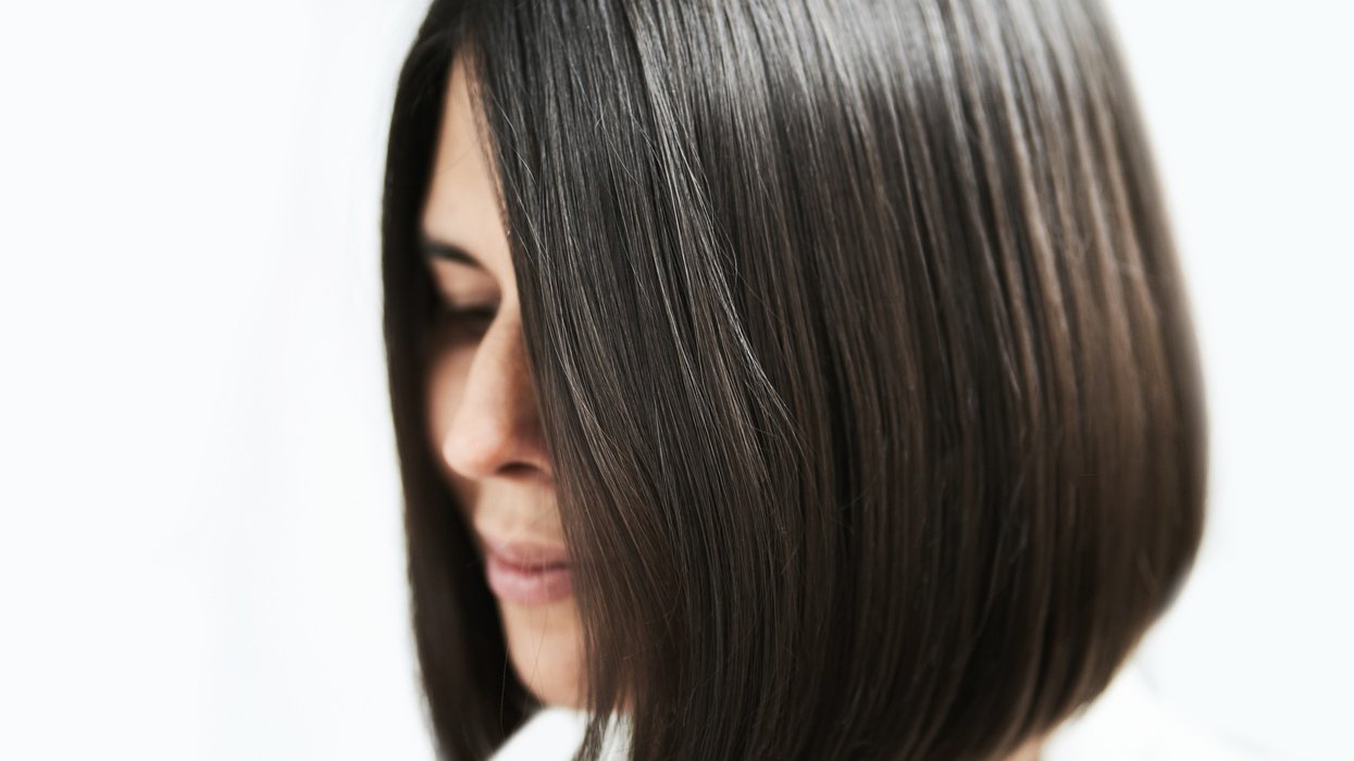 Woman with dark brown bob haircut
