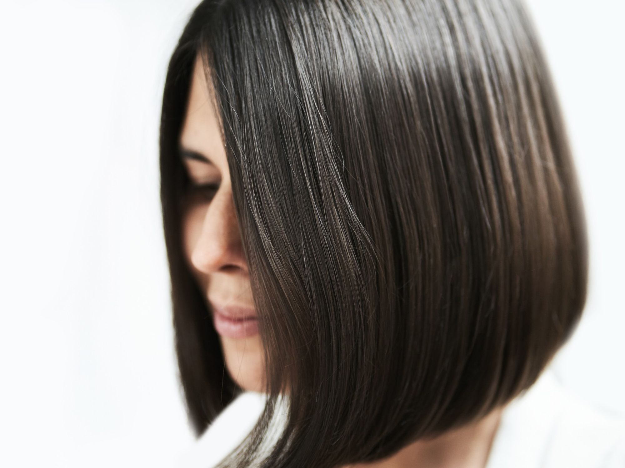 Woman with dark brown bob haircut
