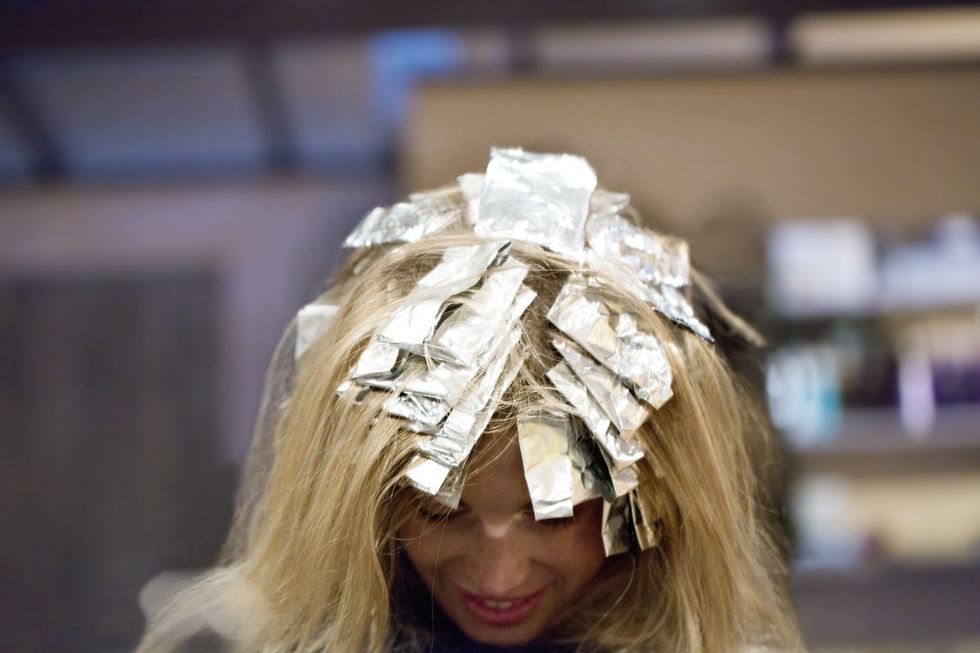 Woman with hair in foils