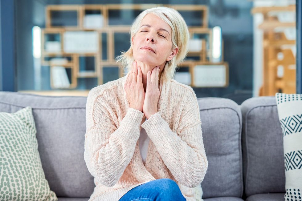 Woman with sore throat