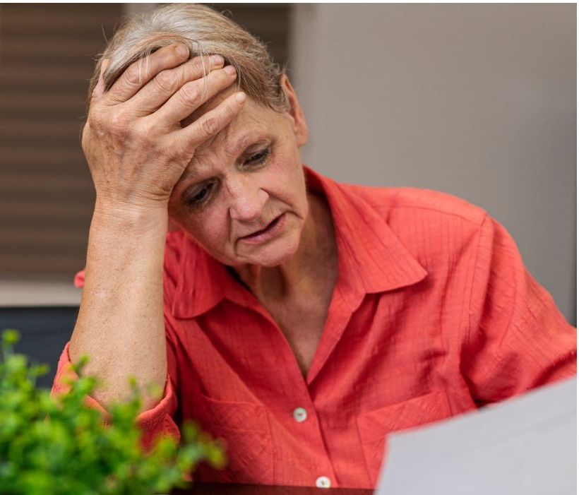 Woman worried and Jobcentre Plus